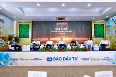 Hội thảo “Sửa thuế để thúc đẩy hoạt động doanh nghiệp,” do báo Đầu tư-Bộ Kế hoạch và Đầu tư tổ chức ngày 14/8. (Ảnh: Vietnam+)