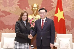 Chủ tịch Quốc hội Vương Đình Huệ tiếp bà Ana María Mari Machado, Phó Chủ tịch Quốc hội Cuba. (Ảnh: Doãn Tấn/TTXVN)