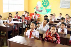 Năm học 2014-2015 là năm đầu tiên Bộ Giáo dục và Đào tạo áp dụng Thông tư 30. (Ảnh: Quý Trung/TTXVN)