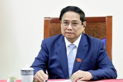 Thủ tướng Phạm Minh Chính điện đàm với Thủ tướng Singapore Lawrence Wong. (Ảnh: Dương Giang/TTXVN)