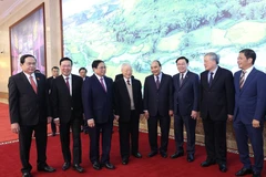 Tổng Bí thư Nguyễn Phú Trọng; Chủ tịch nước Nguyễn Xuân Phúc; Chủ tịch Quốc hội Vương Đình Huệ; Thủ tướng Phạm Minh Chính và các đại biểu dự hội nghị. (Ảnh: Dương Giang/TTXVN)