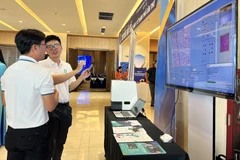 Các giải pháp y tế thông minh được triển lãm tại hội thảo. (Ảnh: Ánh Tuyết/TTXVN)