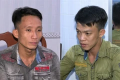 Huỳnh Văn Tèo (phải) và Mai Xuân Dũng (trái) tại cơ quan công an. (Nguồn: Cơ quan công an)