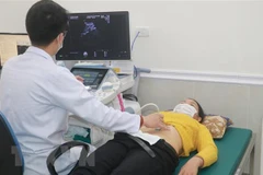 Khám sàng lọc trước sinh. (Nguồn: TTXVN)