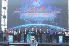 Các đại biểu thực hiện nghi thức khai mạc Festival Thanh niên Quốc tế lần thứ 2, năm 2023. (Ảnh: Minh Đức/TTXVN)