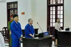 Hai đối tượng mua bán trái phép hơn 45kg ma túy bị tuyên án tử hình. (Ảnh: Nguyên Linh/TTXVN) 