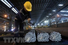 Sản xuất thép thanh tại một doanh nghiệp. (Ảnh: Tuấn Anh/TTXVN)