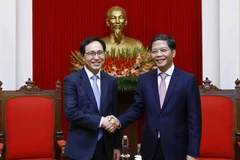 Trưởng Ban Kinh tế Trung ương Trần Tuấn Anh tiếp Tổng Giám đốc Tổ hợp Samsung Việt Nam Choi Joo-ho. (Ảnh: An Đăng/TTXVN)