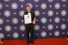 Giải thưởng Tác động Phát triển được trao cho Trần Đặng Đình Áng, đồng sáng lập và CEO của Công ty Annalise.ai. (Ảnh: Văn Linh/TTXVN)