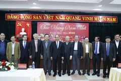 Chủ tịch nước Nguyễn Xuân Phúc và các đại biểu. (Ảnh: Thống Nhất/TTXVN) 