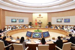 Quang cảnh hội nghị trực tuyến Chính phủ với địa phương. (Ảnh: Dương Giang/TTXVN)