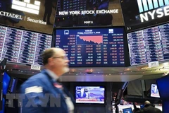 Bảng tỷ giá chứng khoán tại Sàn giao dịch chứng khoán New York, Mỹ. (Ảnh: THX/TTXVN) 
