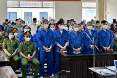 Các bị cáo tại phiên xét xử sơ thẩm sáng 16/3. (Ảnh: Thanh Sang/TTXVN)