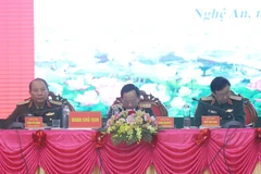 Đoàn Chủ tịch chủ trì Hội thảo. (Ảnh: Xuân Tiến/TTXVN) 