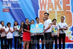 Cuộc thi nhảy Flashmob chào đón khóa 2015 với chủ đề “BE ALL YOU CAN BE” (hãy là tất cả những gì bạn muốn). (Ảnh: Doãn Đức/Vietnam+)