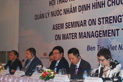 Phó Thủ tướng, Bộ trưởng Bộ Ngoại giao Phạm Bình Minh và các đại biểu tại hội thảo. (Ảnh: Văn Trí/TTXVN)