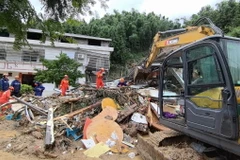 Hiện trường vụ lở đất tại Hoành Dương, tỉnh Hồ Nam, Trung Quốc. (Ảnh: THX/TTXVN)