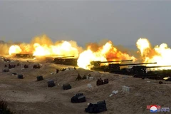 Một cuộc diễn tập pháo binh của quân đội Triều Tiên. (Ảnh: AFP/TTXVN)