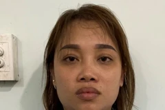 Đối tượng Phan Thị Kiều Vân bị tạm giữ tại cơ quan điều tra. (Ảnh: TTXVN phát)