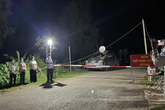 Lệnh gỡ bỏ chốt chặn phòng chống dịch COVID-19, dứt hoạt động vùng thiết lập cách ly y tế xã Si Pa Phìn (huyện Nậm Pồ, tỉnh Điện Biên). (Ảnh: TTXVN phát)