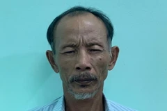 Đối tượng Bùi Văn Trực bị bắt giữ tại cơ quan Công an. (Ảnh: Thanh Tân/TTXVN)