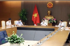  Phó Thủ tướng Vũ Đức Đam, Trưởng Ban Chỉ đạo Quốc gia phòng, chống dịch COVID-19 chủ trì họp trực tuyến với lãnh đạo các tỉnh Bắc Ninh và Bắc Giang về công tác phòng, chống dịch ở các địa phương này. (Ảnh: Phạm Kiên/TTXVN)