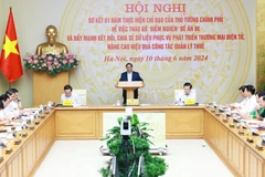 Thủ tướng Phạm Minh Chính chủ trì Hội nghị sơ kết 01 năm thực hiện tháo gỡ vướng mắc thực hiện Đề án 06. (Ảnh: Dương Giang/TTXVN)