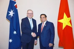 Thủ tướng Phạm Minh Chính gặp Thủ tướng Australia Anthony Albanese. (Ảnh: Dương Giang/TTXVN)