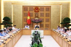 Phó Thủ tướng Trần Hồng Hà chủ trì cuộc họp. (Ảnh: Văn Điệp/TTXVN)