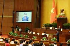 Chủ tịch Quốc hội Trần Thanh Mẫn điều hành phiên chất vấn. (Ảnh: Thống Nhất/ TTXVN)