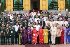 Chủ tịch nước Tô Lâm với các đại biểu. (Ảnh: Nhan Sáng/TTXVN)