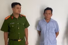 Đối tượng Trần Văn Hoàng Giang tại cơ quan Công an. (Ảnh: TTXVN phát)
