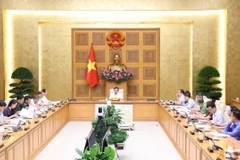 Phó Thủ tướng Trần Hồng Hà chủ trì cuộc họp. (Ảnh: Văn Điệp/TTXVN)