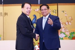 Thủ tướng Phạm Minh Chính tiếp ông Asakawa Masatsugu, Chủ tịch Ngân hàng Phát triển châu Á (ADB). (Ảnh: Dương Giang/TTXVN)