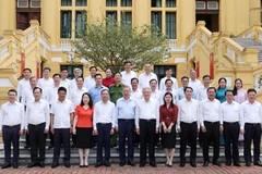 Chủ tịch nước Tô Lâm với lãnh đạo Tòa án Nhân dân Tối cao và các đại biểu. (Ảnh: Nhan Sáng/TTXVN)