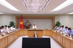 Phó Thủ tướng Trần Hồng Hà chủ trì cuộc họp. (Ảnh: Văn Điệp/TTXVN)