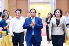 Thủ tướng Phạm Minh Chính đến dự Hội nghị Tổng kết 10 năm thực hiện Chỉ thị số 40-CT/TW ngày 22/11/2014 của Ban Bí thư về tăng cường sự lãnh đạo của Đảng đối với tín dụng chính sách xã hội. (Ảnh: Dương Giang/TTXVN)