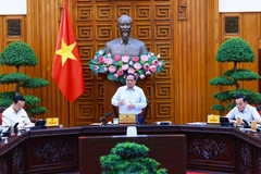Thủ tướng Phạm Minh Chính chủ trì họp Thường trực Chính phủ về một số Luật. (Ảnh: Dương Giang/TTXVN)