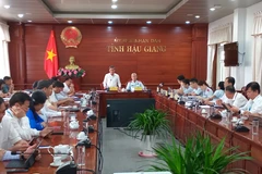 Quang cảnh buổi công bố việc thanh tra tuyển dụng, bổ nhiệm cán bộ ở Hậu Giang. (Ảnh: Duy Khương/TTXVN)