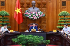 Thủ tướng Phạm Minh Chính chủ trì họp Thường trực Chính phủ về kiểm soát lạm phát. (Ảnh: Dương Giang/TTXVN)