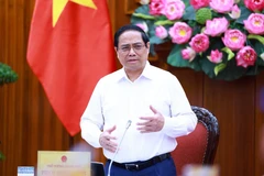 Thủ tướng Phạm Minh Chính kết luận buổi làm việc với các đơn vị để đẩy nhanh tiến độ hoàn thành Dự án đường dây 500kV mạch 3. (Ảnh: Dương Giang/TTXVN)