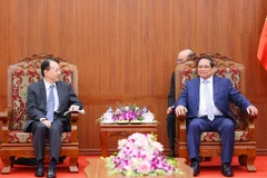 Thủ tướng Phạm Minh Chính tiếp ông Masatsugu Asakawa, Chủ tịch Ngân hàng Phát triển châu Á. (Ảnh: Dương Giang/TTXVN)