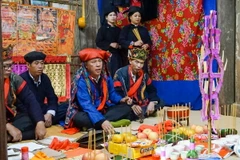 Trong khuôn khổ Tuần lễ “Đại đoàn kết các dân tộc-Di sản Văn hóa Việt Nam” năm 2023, ngày 25/11/2023, tại Làng Văn hóa, Du lịch các dân tộc Việt Nam (Hà Nội), đồng bào Nùng tỉnh Bắc Kạn tổ chức tái hiện lễ cấp sắc. (Ảnh: Khánh Hòa/TTXVN)