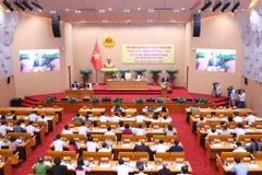 Quang cảnh buổi khai mạc Kỳ họp thứ 18, Hội đồng nhân dân thành phố Hà Nội khóa XVI, nhiệm kỳ 2021-2026. (Ảnh: Văn Điệp/TTXVN)