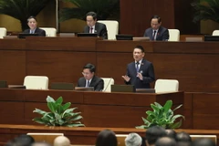 Bộ trưởng Bộ Tài Chính Hồ Đức Phớc giải trình, làm rõ một số vấn đề đại biểu Quốc hội nêu. (Ảnh: An Đăng/TTXVN)