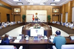 Ủy ban Thường vụ Quốc hội cho ý kiến về hai dự thảo Luật Phòng, chống mua bán người (sửa đổi) và Luật Công chứng (sửa đổi). (Ảnh: Doãn Tấn/TTXVN)