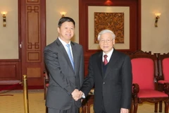 Tổng Bí thư Nguyễn Phú Trọng tiếp ông Tống Đào, Trưởng Ban Liên lạc đối ngoại Trung ương Đảng Cộng sản Trung Quốc, Đặc phái viên của Tổng Bí thư, Chủ tịch nước Trung Quốc Tập Cận Bình. (Ảnh: Trí Dũng/TTXVN)