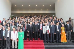 Tổng Bí thư Nguyễn Phú Trọng với các đại biểu dự Đại hội. (Ảnh: Trí Dũng/TTXVN)