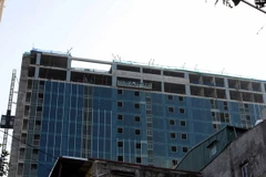 Tòa nhà 8B Lê Trực nhìn từ phố Sơn Tây. (Ảnh: Tuấn Anh/TTXVN)