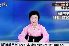 Phát thanh viên Triều Tiên đọc bản tin trên truyền hình nhà nước ngày 6/1. (Nguồn: THX/TTXVN)